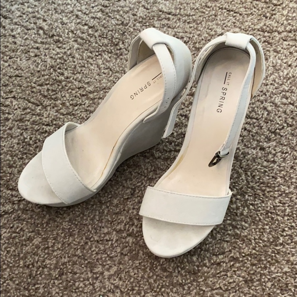 Call it spring wedge heel, used size 8
